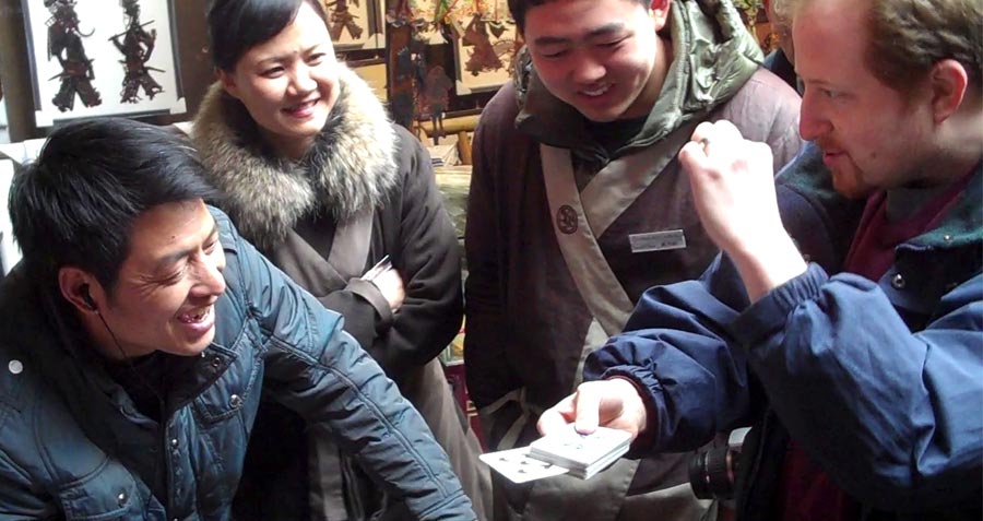 Image of Chinese people enjoying the card magic of Lee Asher