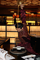The traditional way to pour tea.