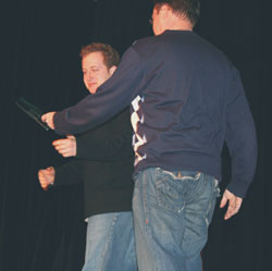 Chris Kenner handing Lee Asher the first ever Inspiration Award at the Magic Film Festival.